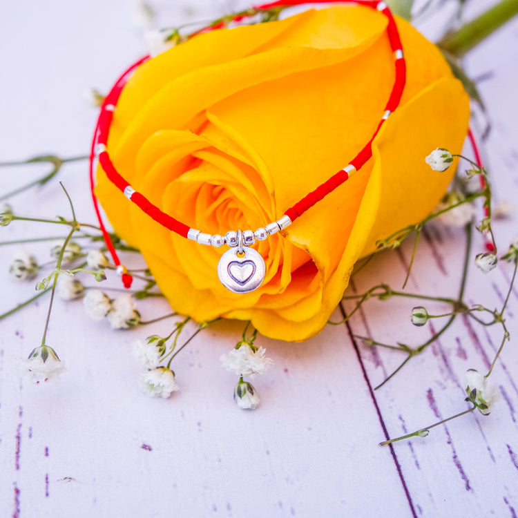 Pulsera mostacillas rojas Corazón tallado